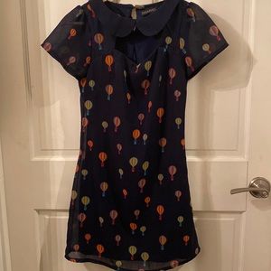 Navy minidress with hot air balloons.